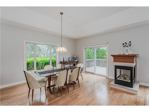 49 Cherry Blossom Circle, Guelph, ON - Indoor Photo Showing Dining Room With Fireplace