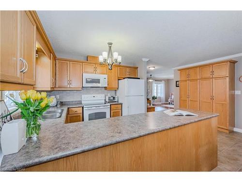 22 Washburn Drive, Guelph, ON - Indoor Photo Showing Kitchen With Double Sink