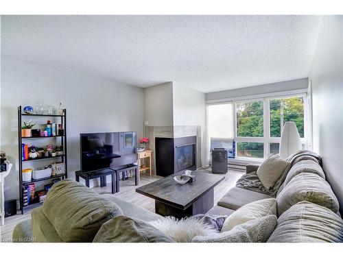 402-5 Jacksway Crescent, London, ON - Indoor Photo Showing Living Room With Fireplace