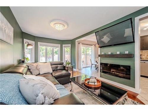 67 Laughland Lane, Guelph, ON - Indoor Photo Showing Living Room With Fireplace