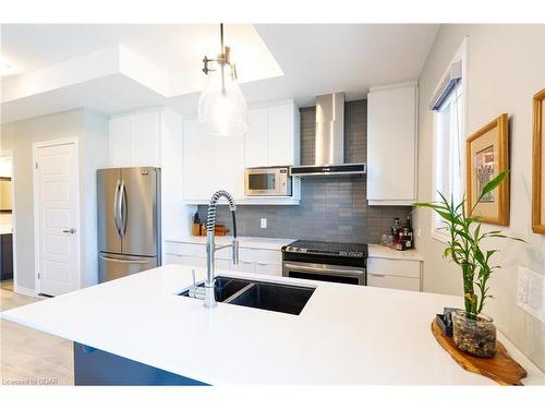 C11-1430 Highland Road West, Kitchener, ON - Indoor Photo Showing Kitchen With Stainless Steel Kitchen With Double Sink With Upgraded Kitchen