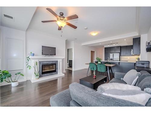 708-160 Macdonell Street, Guelph, ON - Indoor Photo Showing Living Room With Fireplace