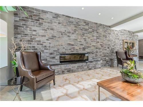 708-160 Macdonell Street, Guelph, ON - Indoor Photo Showing Living Room With Fireplace