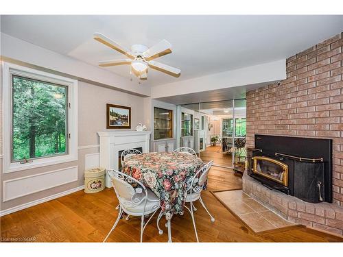 1040 Riverbank Drive, Cambridge, ON - Indoor Photo Showing Dining Room With Fireplace