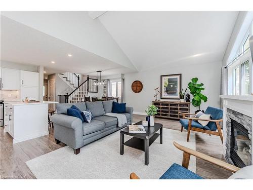 74 Queen Charlotte Crescent, Kitchener, ON - Indoor Photo Showing Living Room With Fireplace