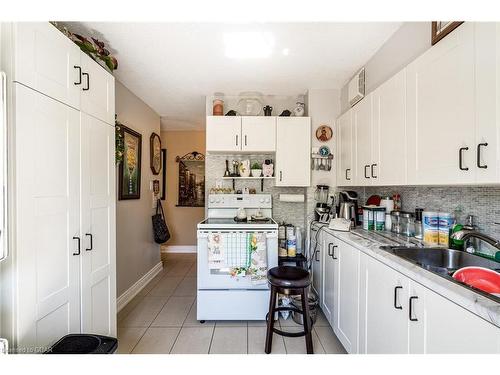 309-700 Dynes Road, Burlington, ON - Indoor Photo Showing Kitchen With Double Sink