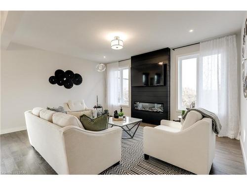 36 Rosina Lane, Thamesford, ON - Indoor Photo Showing Living Room With Fireplace