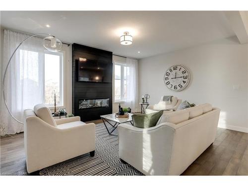 36 Rosina Lane, Thamesford, ON - Indoor Photo Showing Living Room With Fireplace