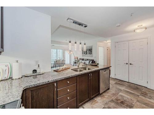 319-106 Bard Boulevard, Guelph, ON - Indoor Photo Showing Kitchen With Double Sink