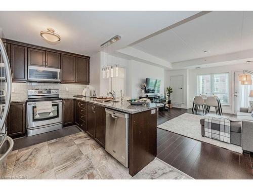 319-106 Bard Boulevard, Guelph, ON - Indoor Photo Showing Kitchen With Stainless Steel Kitchen With Double Sink With Upgraded Kitchen