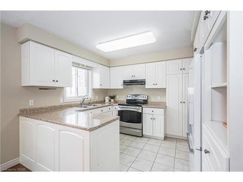 24 Beechlawn Boulevard, Guelph, ON - Indoor Photo Showing Kitchen With Double Sink