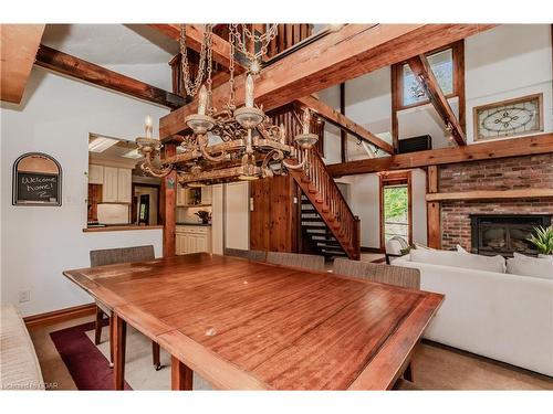 15 River Bluff Path, Guelph/Eramosa, ON - Indoor Photo Showing Dining Room With Fireplace