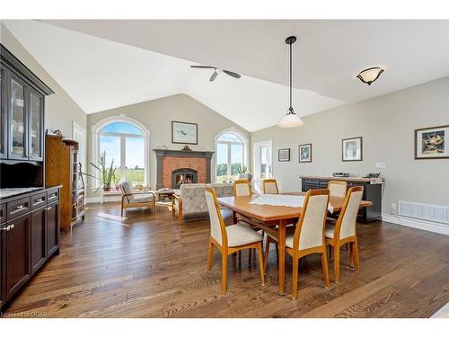 9364 Sideroad 27, Erin, ON - Indoor Photo Showing Dining Room With Fireplace