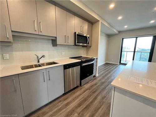 1411-15 Queen Street S, Hamilton, ON - Indoor Photo Showing Kitchen With Double Sink