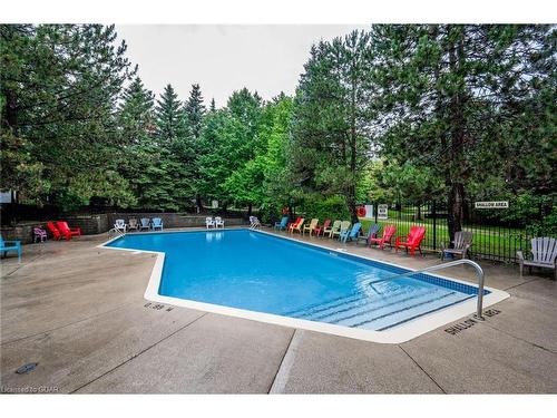 127-109 Bristol Road E, Mississauga, ON - Outdoor With In Ground Pool With Backyard