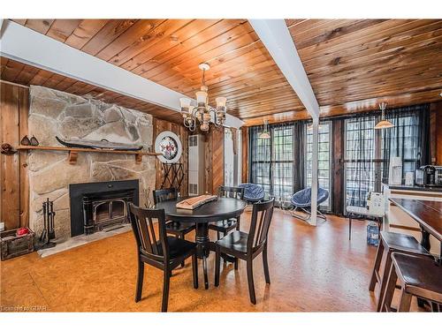 17 Thomas Street, Red Bay, ON - Indoor Photo Showing Dining Room With Fireplace