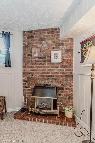 14 Avra Court, Guelph, ON - Indoor With Fireplace