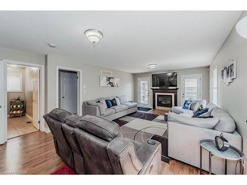 39 Ingram Drive, Guelph, ON - Indoor Photo Showing Living Room With Fireplace