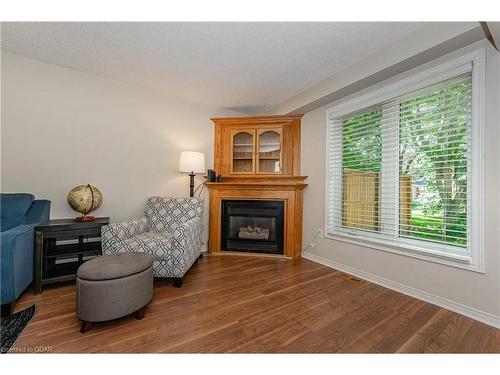 23-60 Ptarmigan Drive, Guelph, ON - Indoor Photo Showing Living Room With Fireplace