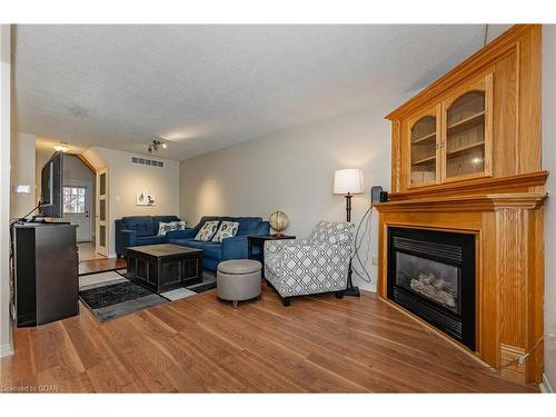 23-60 Ptarmigan Drive, Guelph, ON - Indoor Photo Showing Living Room With Fireplace