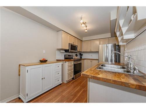 23-60 Ptarmigan Drive, Guelph, ON - Indoor Photo Showing Kitchen With Stainless Steel Kitchen With Double Sink