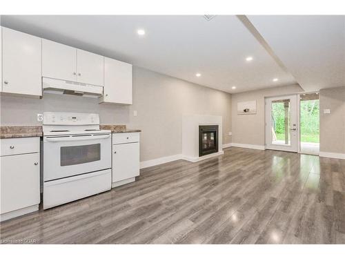 78 Gibbons Drive, Fergus, ON - Indoor Photo Showing Kitchen With Fireplace