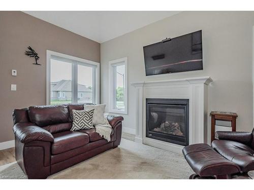 18-744 Nelson Street W, Port Dover, ON - Indoor Photo Showing Living Room With Fireplace