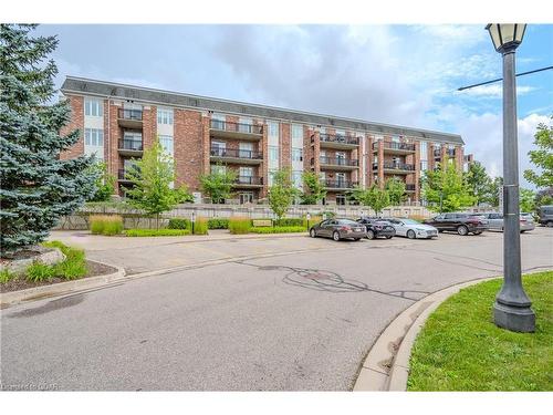 406-65 Bayberry Drive, Guelph, ON - Outdoor With Balcony With Facade