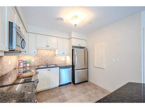 406-65 Bayberry Drive, Guelph, ON - Indoor Photo Showing Kitchen With Stainless Steel Kitchen With Double Sink