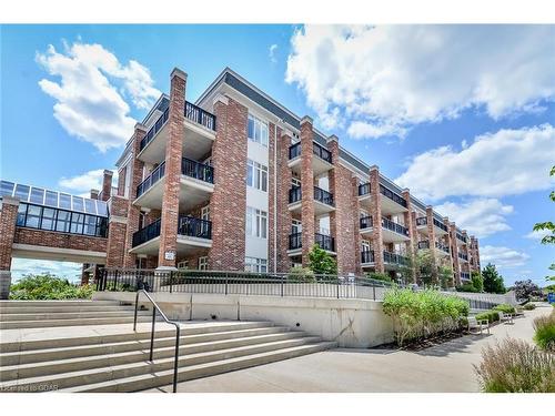 406-65 Bayberry Drive, Guelph, ON - Outdoor With Balcony With Facade