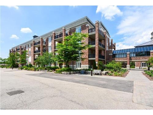 406-65 Bayberry Drive, Guelph, ON - Outdoor With Balcony With Facade