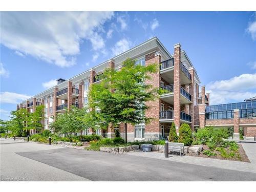 406-65 Bayberry Drive, Guelph, ON - Outdoor With Balcony With Facade