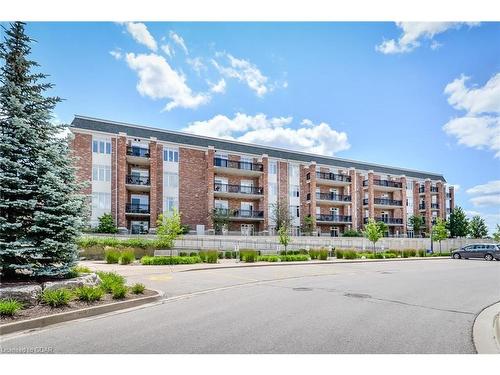 406-65 Bayberry Drive, Guelph, ON - Outdoor With Balcony With Facade