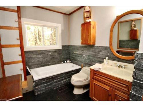 82 Mcivor Drive, Miller Lake, ON - Indoor Photo Showing Bathroom