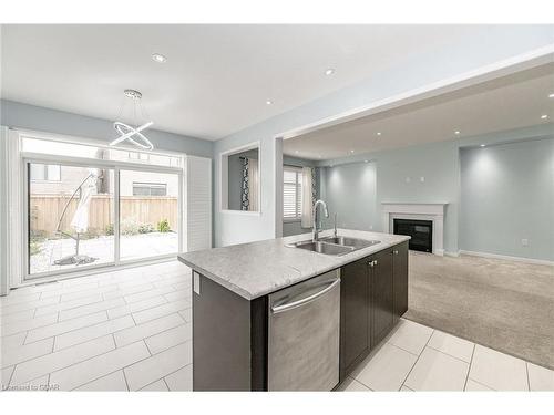 29 Mull Avenue, Caledonia, ON - Indoor Photo Showing Kitchen With Fireplace With Double Sink