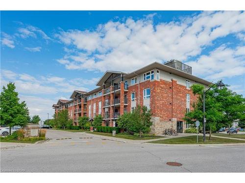 301-43 Waterford Drive, Guelph, ON - Outdoor With Facade