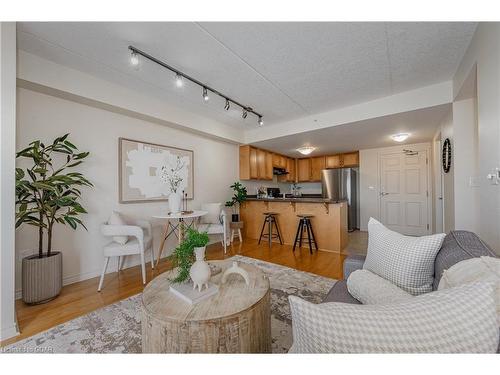 301-43 Waterford Drive, Guelph, ON - Indoor Photo Showing Living Room