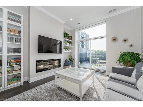 201-1880 Gordon Street, Guelph, ON - Indoor Photo Showing Living Room With Fireplace