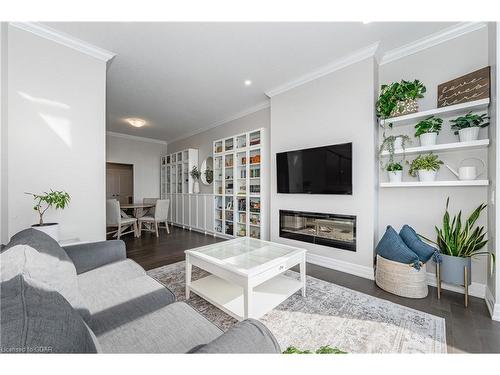 201-1880 Gordon Street, Guelph, ON - Indoor Photo Showing Living Room With Fireplace