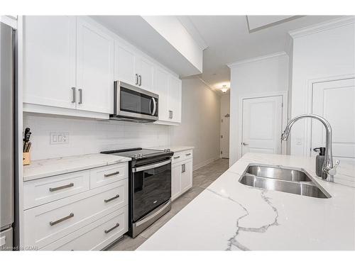 201-1880 Gordon Street, Guelph, ON - Indoor Photo Showing Kitchen With Double Sink