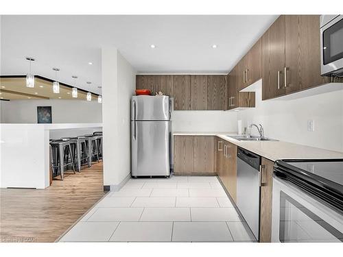 408-106 Bard Boulevard, Guelph, ON - Indoor Photo Showing Kitchen With Stainless Steel Kitchen With Double Sink