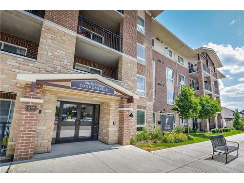 303-103 Westminster Crescent, Fergus, ON - Outdoor With Balcony With Facade