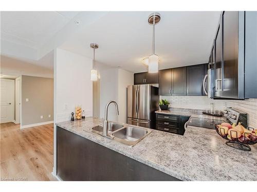 303-103 Westminster Crescent, Fergus, ON - Indoor Photo Showing Kitchen With Stainless Steel Kitchen With Double Sink With Upgraded Kitchen