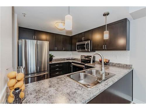 303-103 Westminster Crescent, Fergus, ON - Indoor Photo Showing Kitchen With Stainless Steel Kitchen With Double Sink With Upgraded Kitchen