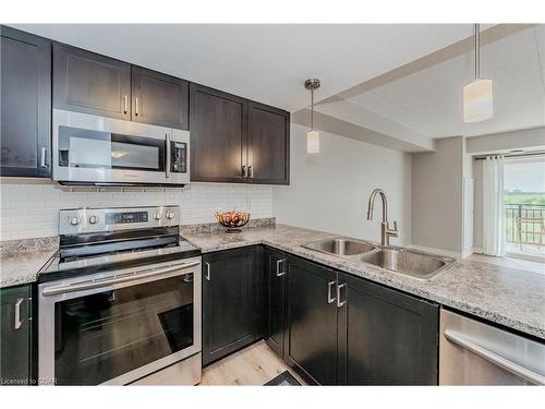 303-103 Westminster Crescent, Fergus, ON - Indoor Photo Showing Kitchen With Stainless Steel Kitchen With Double Sink With Upgraded Kitchen