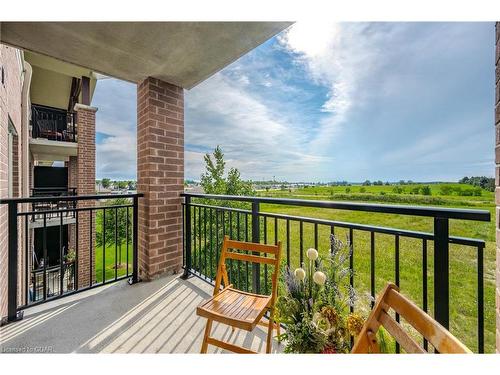 303-103 Westminster Crescent, Fergus, ON - Outdoor With Balcony With View With Exterior