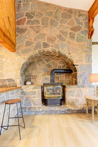 9811 Creek Road, Clifford, ON - Indoor Photo Showing Other Room With Fireplace