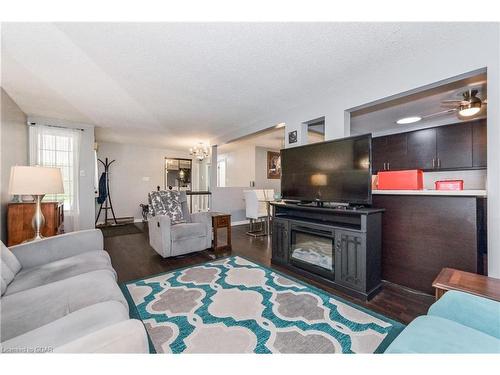 260 Strathallan Street, Centre Wellington, ON - Indoor Photo Showing Living Room With Fireplace