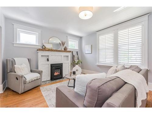 129 Garafraxa Street E, Fergus, ON - Indoor Photo Showing Living Room With Fireplace