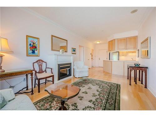 705-1 Lomond Drive, Etobicoke, ON - Indoor Photo Showing Living Room With Fireplace